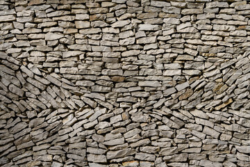 stone wall dry masonry texture