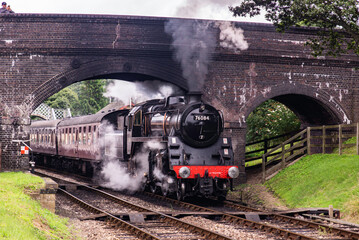 BR Standard 4 – 76084 pulling a rake of carriages