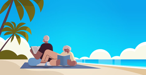 senior couple reading books at beach old man and woman family spending time together relaxation retirement