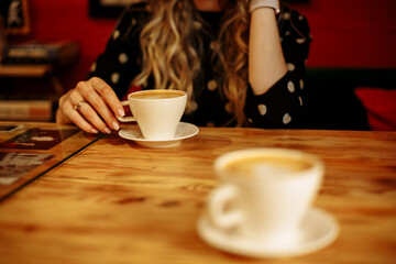 a cup of coffee on the table