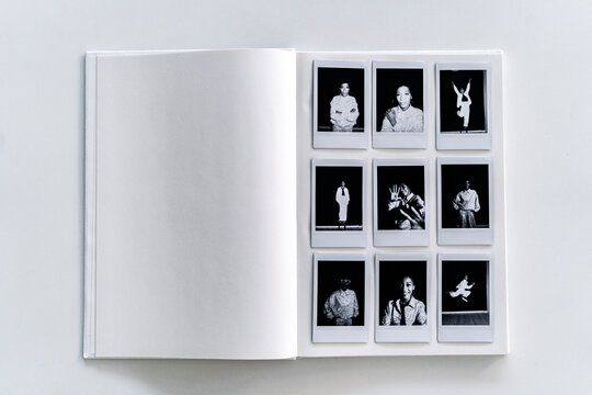 Polaroid photographs album on white background