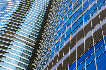 Modern office building with glass facade for background