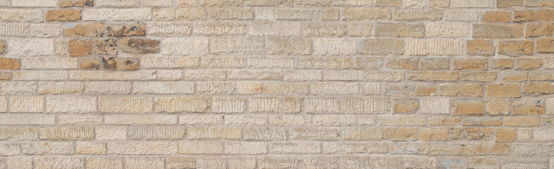 background of old sandstone brick wall texture