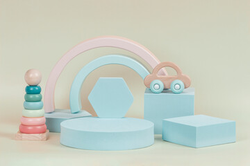 Baby kid toy background. Composition of colorful educational natural wooden toys and geometric...
