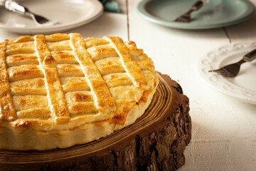 Brazilian Chicken Pie -  Homemade Chicken Pie on Spatula on a Wooden Table Rustic Appeal