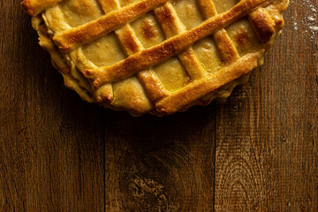 Brazilian Chicken Pie -  Homemade Chicken Pie on Spatula on a Wooden Table Rustic Appeal