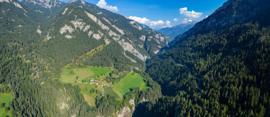 Fototapeta na wymiar Aerial view around the village Scharans in Switzerland on a sunny day in summer.