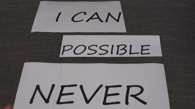 motivation and encouragement objective. Concept of think positive, self belief and success of achievement. Cut a letter and you can do everything's - possible vs impossible, never vs ever, I can't