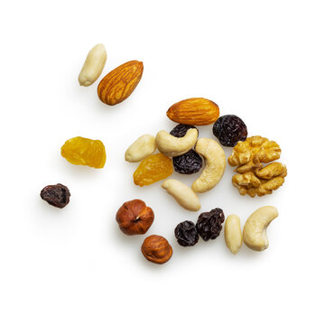 Isolated appetizing mix of placer nuts and raisin on a white background 