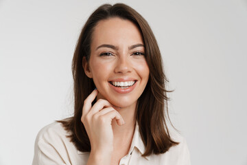 Young european woman laughing and looking at camera