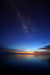 Fototapeta na wymiar The twilight sky with star at the lake.