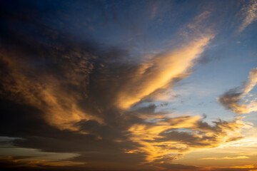 Obraz na płótnie Canvas The clouds with sunlight on the sky background.