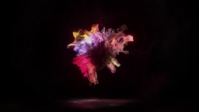 Colorful particles butterfly explosion on black background 4k Footage