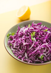Fresh and healthy red cabbage salad served in a bowl.