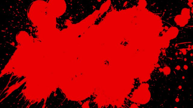 Red paint splatter on black background 4k footage
