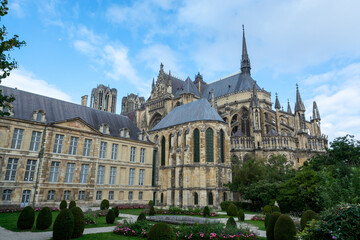 Fototapeta na wymiar View from back side on gothic Roman Catholic cathedral church Notre-Dame in central part of old French city Reims, France