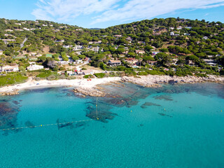Summer holidays on French Riviera, aerial view on rocks and sandy beach Escalet near Ramatuelle and...