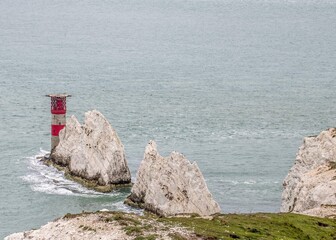 The Needles Lighthouse on the outermost of chalk rocks at The Needles on The Isle of Wight Hampshire, England