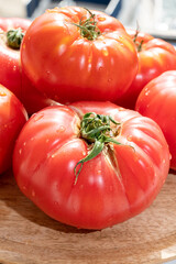 Tasty big ripe french tomatoes from Provence ready to eat in healthy salad