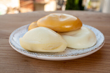 Cheese collection, variety of Italian cow milk cheese flat scamorza
