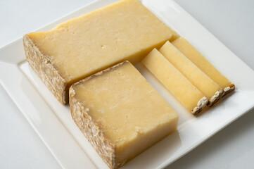 Cheese collection, hard French cheese old cantal made from raw cow milk with rind