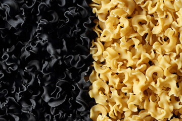 Black and white mafalde pasta background. Squid ink pasta.