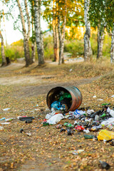 Garbage bags piled in the forest. People illegally thrown garbage into the forest. Concept of man and nature
