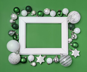 White frame with Christmas tree decorations mockup