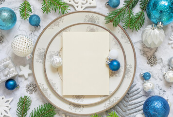 Festive table setting of with fir tree branches and Christmas decorations. Mockup