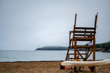 Empty life guard watchtower on the sand beach of Acadia National Park