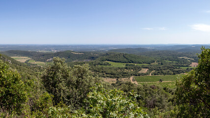 Fototapeta na wymiar Rural landscape view on the valley of Pic Saint-Loup mountain in Languedoc-Roussillon, France