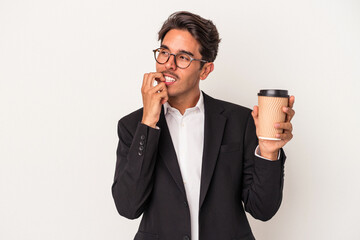 Young mixed race business man holding take away coffee  isolated on white background relaxed thinking about something looking at a copy space.