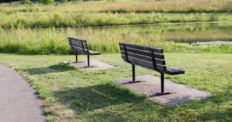 The two benches in the countryside park.