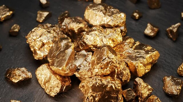 Rotate around a group of gold nuggets on a black background. Large and small golden stones, macro photography.