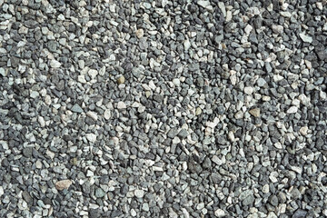 gray gravel stones abstract background. Pebble backdrop. crushed stones, construction rocks...
