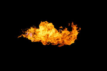 Flames caused by the explosion of the oil isolated on black background. Demonstration of water on...