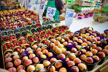 Women selling apples at Jean Talon Market 