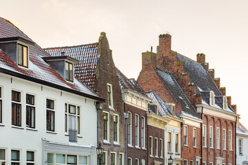 Evening view of snow covered historic houses in the Dutch city center of Doesburg, The Netherlands