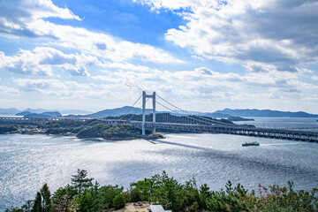 瀬戸大橋とキラキラと輝く海面の風景　岡山県倉敷市 The view of Seto Ohashi bridge at Setonaikai, Inland Sea of Japan, in Kurashiki city, Okayama pref. Japan 