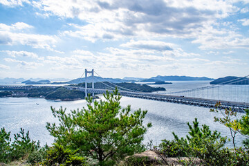 瀬戸大橋とキラキラと輝く海面の風景　岡山県倉敷市 The view of Seto Ohashi bridge at Setonaikai, Inland Sea of Japan, in Kurashiki city, Okayama pref. Japan 