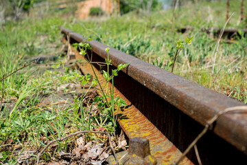 Fototapeta na wymiar Rusty and abandoned train wheels with Railroad in the countryside