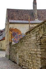 Graffiti on a building in the Old Town, Tallinn, Estonia