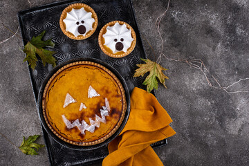 Halloween pumpkin pie in shape of jack-o-lantern