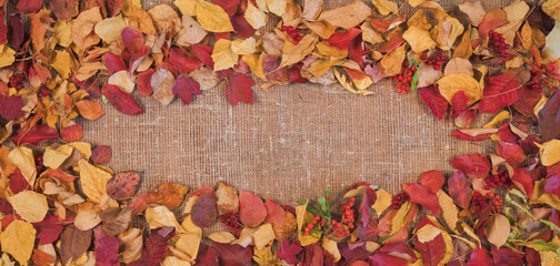 Frame made of leaves on a burlap background, banner, autumn theme