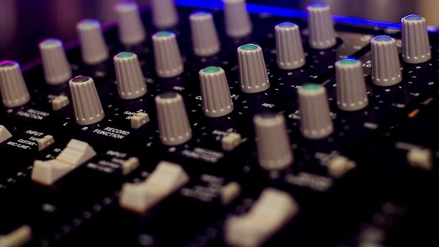 Portative cassette tape studio mixer closeup shot. Focus changing from near to far.