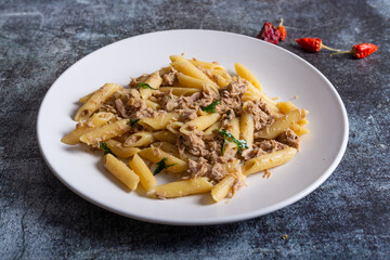 Penne pasta with tuna fish. Healthy and qickly lunch.