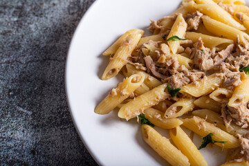 Penne pasta with tuna fish. Healthy and qickly lunch.
