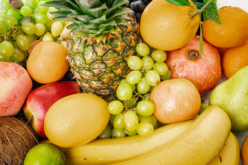Assortment of healthy raw fruits. Mixed fruits.