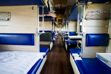 Interior of a typical russian long-distance RZD train with beds for sleeping
