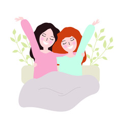 
Two girls, women are sitting in bed and under a blanket. A warm, friendly hug.
